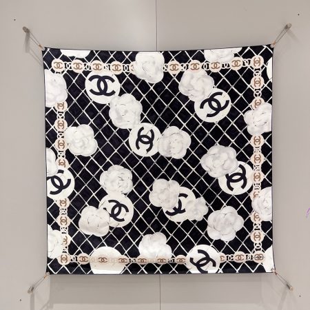 Classic black camellia silk scarf, 90x90cm, 100% silk, matte finish, hand-rolled edges. Comes with zip case.