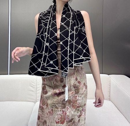 Chanel new floral velvet scarf. Elegant, soft silk-cashmere design with pearl series. Versatile, high-quality 140x140cm accessory for all seasons.