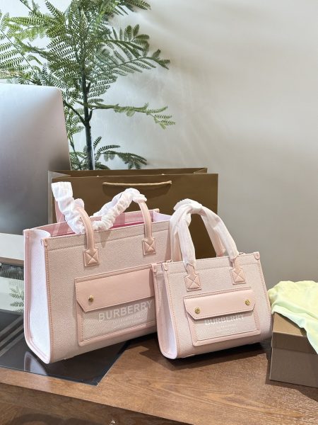 Burberry canvas tote, so pretty! This pink is perfect for sweet looks. Small size fits an iPad for study.
