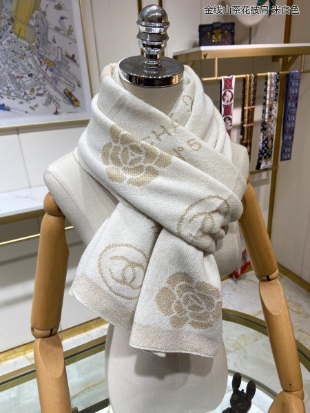 Limited edition CHANEL No.5 cashmere shawl with gold thread camellia pattern. Premium quality, versatile and collectible. Exclusive supply.