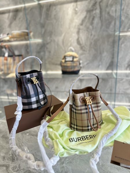 Small TB bucket bag with drawstring, Burberry classic check pattern, Italian leather trim, elegant design. 15x20