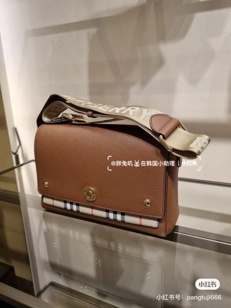Burberry unisex messenger bag.