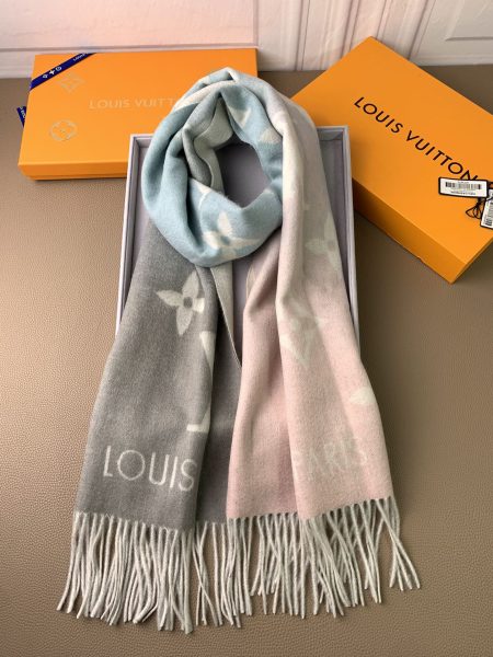 L limited edition pink-blue gradient cashmere scarf. Highly sought-after color, hard to find. Elegant and gentle design, perfect with autumn/winter coats. Limited stock available. Size: 45*190cm.