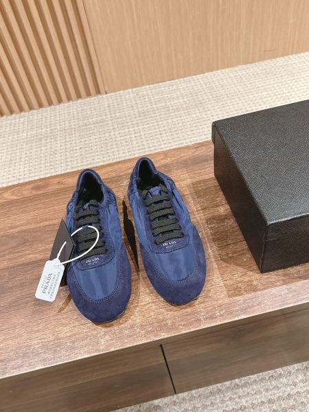 Prada women's training shoes in white. Features suede upper, lambskin lining, and TPU sole. Lightweight and comfortable. Sizes 35-41.