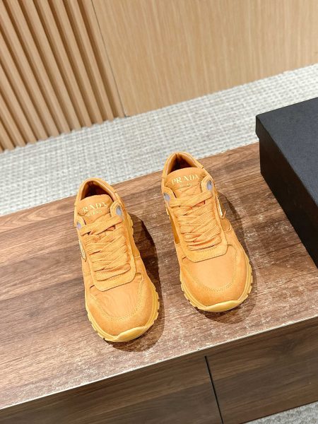 Prada spring-summer women's sneakers in suede and waterproof fabric, triangle logo, sizes 35-39.