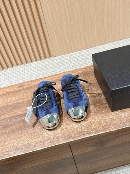 Prada New Metal Toe Low-Profile Training Shoes. Upper: suede/fabric. Lining: lambskin. Sole: TPU. Sizes 35-41. Lightweight, comfortable, stylish.
