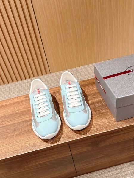 Top version Prada men's sneakers. 90s Luna Rossa sailing design returns. Leather and breathable Bike fabric. Oversize rubber sole. Prada Linea Rossa logo. Removable 