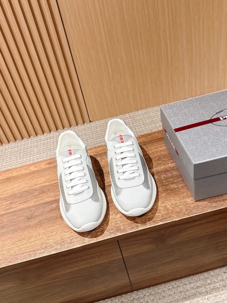 Prada men's sneakers, 90s Luna Rossa sailing design. Leather and breathable Bike fabric. Oversize rubber sole, 3.5cm heel. Sizes 39-44.