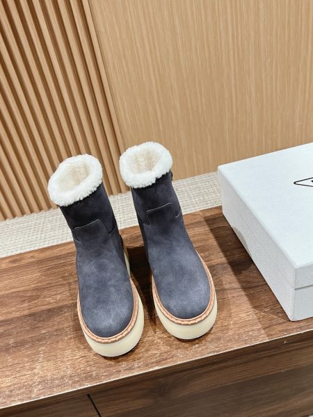 Prada winter boots with triangular logo, two-tone suede, lambswool, leather trim, sizes 35-39.