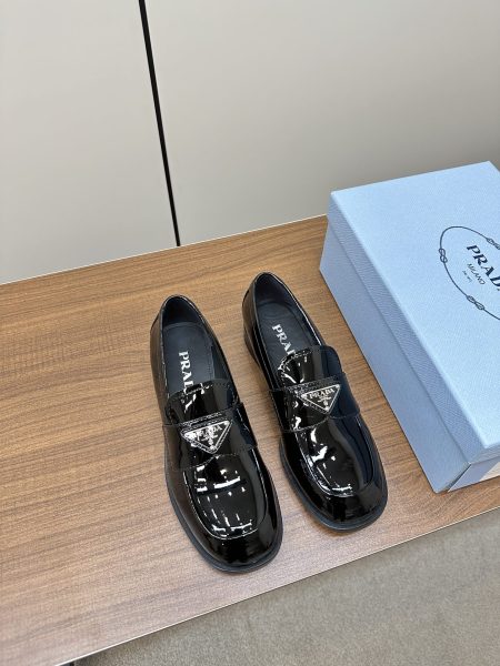 PRADA Loafer with Triangle Logo. Top version, 1:1 custom. This year's trendiest slip-on, British retro style couple's white shoes. Popular among influencers. Crafted from custom split leather with molded triangle logo.