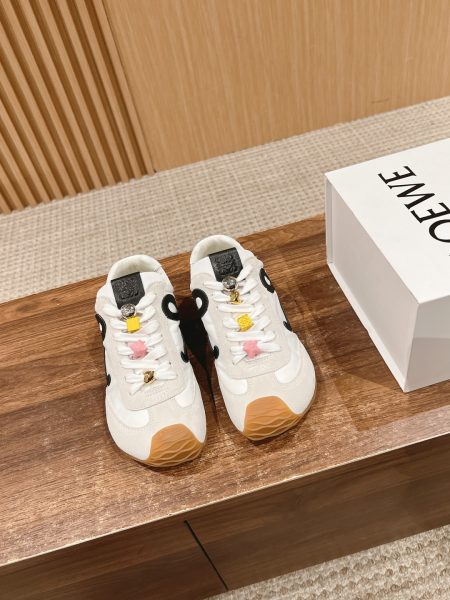 Loewe Ballet Runner 2.0 sneakers feature a redesigned toe and heel for superior comfort. Made from imported suede, calfskin, and trench fabric with a custom mold sole. Simple, versatile, and stylish. Sizes 35-45.