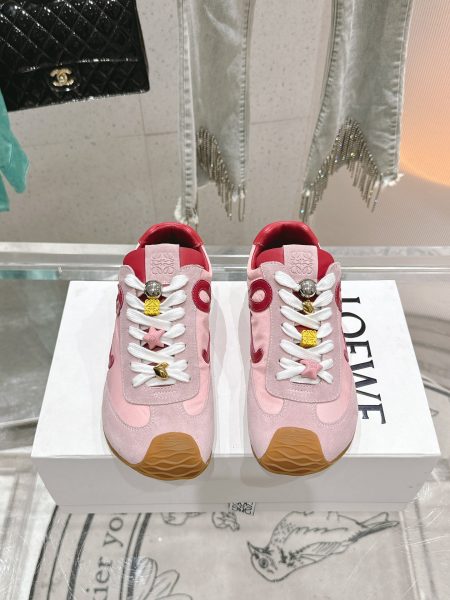 LOEWE's new Ballet Runner 2.0 sneakers feature an asymmetric toe, soft leather lining, and a wave-textured rubber sole. Made from nylon, suede, and soft calfskin. Sizes 35-41.