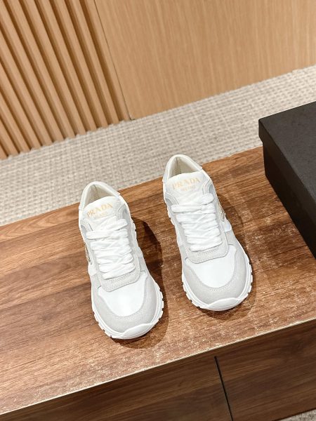 Prada spring-summer women's sneakers in suede and waterproof fabric. Sizes 35-39.