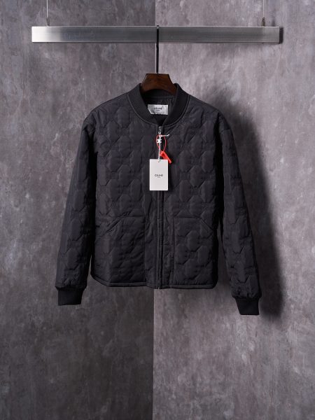 Celine Triomphe embroidered quilted nylon zip-up jacket. Available in sizes 48-54. Features iconic logo, baseball collar, and premium construction.