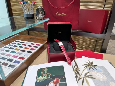 Cartier Tank Must watch with alligator strap, solar quartz movement, square case, quick-release strap.