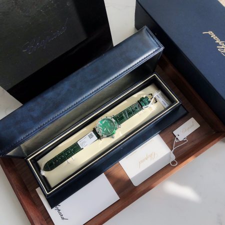 Chopard Happy Sport watch, 36mm case, 5 sliding diamonds, 904L steel, quartz movement, alligator strap, 50 diamonds on bezel. Original box, return accepted.