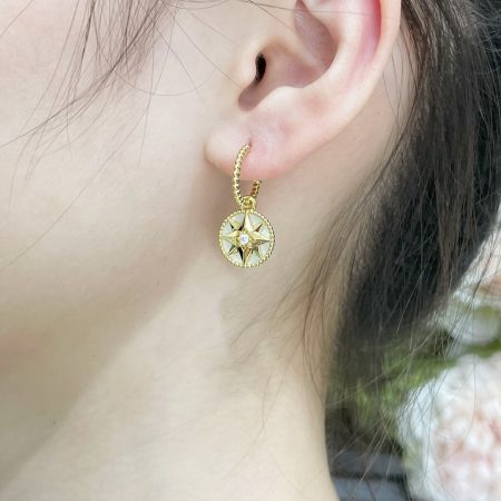 Dior Rose des Vents white mother-of-pearl compass earrings, double-sided 8-pointed star necklace/bracelet/earrings.