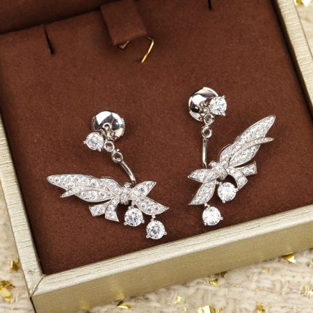 CHAUMET Laurel Earrings: Diamond and white gold design inspired by Josephine's love for laurel, symbolizing victory and modern femininity.